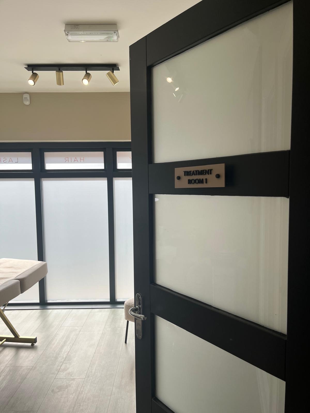 Treatment room door at Papillon Beauty Studio, Warwick